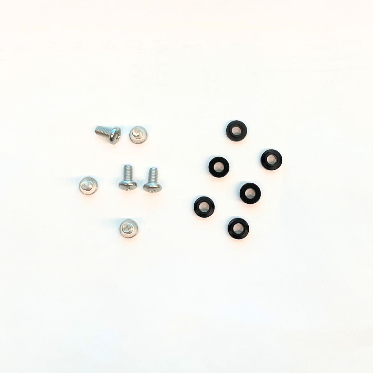 Collection of screws and bolts on a white background